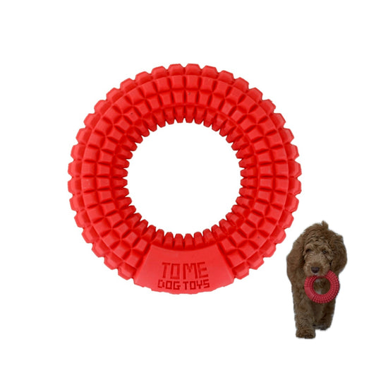Red textured rubber chew ring toy featuring small raised bumps all around its surface, designed for medium to large aggressive chewers to chew, fetch, and promote dental health.